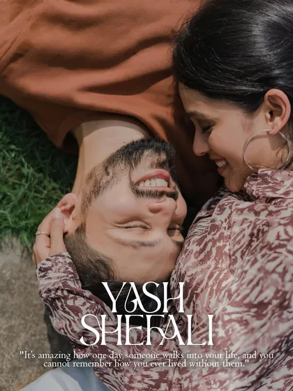 A beautiful overhead shot of the couple lying on the grass, sharing a moment of pure happiness. This intimate perspective makes for a unique and memorable pre-wedding portrait.