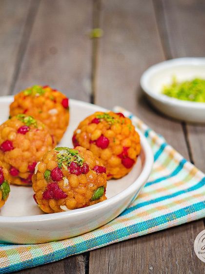 A close-up of our Jodhpuri Laddoos, showing the fine texture and colourful boondi. A perfect bite-sized treat.