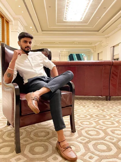 Taking a moment between gigs. A positive mindset is key to managing the hustle, and I always make sure to stay grounded and ready for the next show.