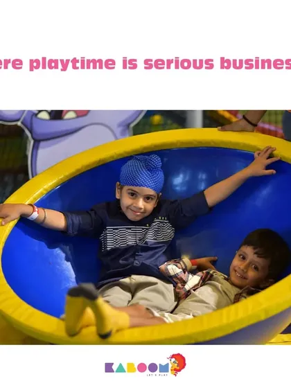 Here, playtime is serious business! These friends are having a great time on the spinner.
