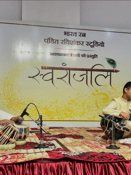 On stage with my tabla accompanist for a live broadcast performance at All India Radio's 'Swaranjali' program in the Pt. Ravi Shankar Studio.