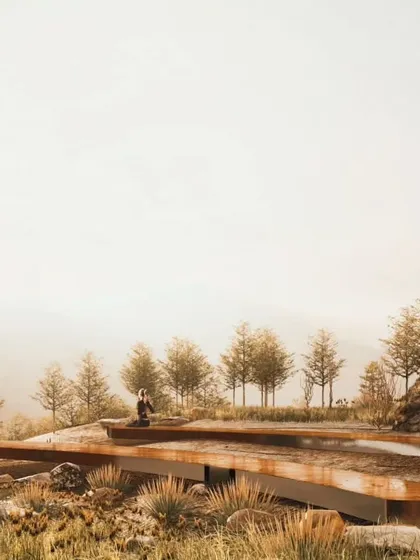 The design incorporates existing rock formations and natural contours, creating spaces for quiet reflection within the landscape.
