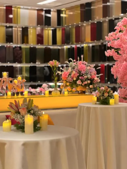 We used soft, ambient lighting to enhance the floral decor. LED candles were placed among the arrangements on cocktail tables and along ledges, creating a warm and inviting glow throughout the space.