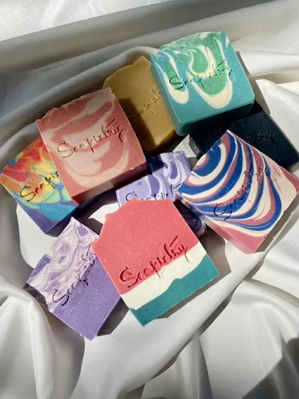 Just look at this beautiful variety! This is a glimpse into the heart of Soapistry. Each artisan soap bar is a unique piece of art, handcrafted with different colors, swirls, and designs. I use only skin-loving oils and butters to ensure they feel as good as they look.