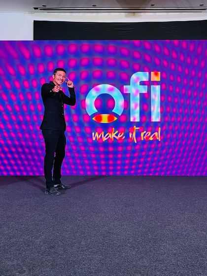 Pointing to a member of the audience during my OFI stage show. Interaction is key to making the magic feel personal and real.