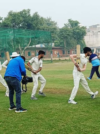 Another angle of our group shadow practice, ensuring every player understands the biomechanics of a good cricket shot.
