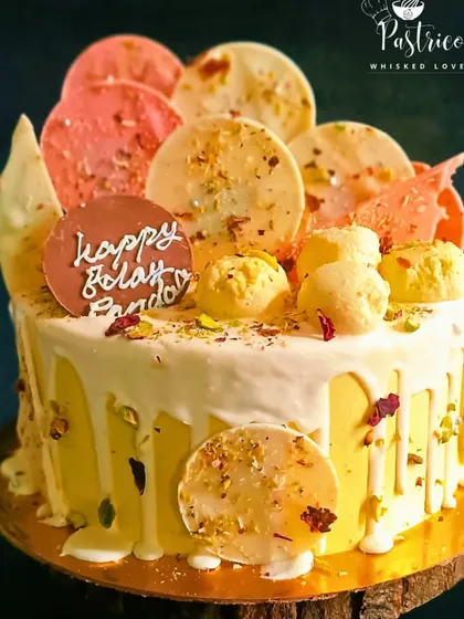 My Rasmalai cake is a bestseller for a reason. I soak a soft pistachio sponge in sweet milk and top it with homemade rasmalai, nuts, and edible chocolate discs, creating a fusion dessert that is both familiar and wonderfully unique.