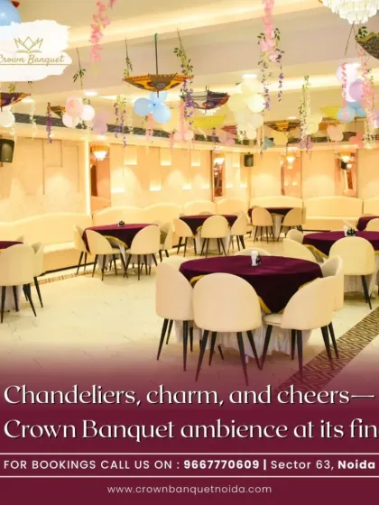 The ambiance of our hall is defined by its elegant details. Modern chandeliers cast a warm glow over the space, complemented by tasteful decor like hanging floral arrangements and colorful umbrellas, creating a charming and cheerful atmosphere for any party.