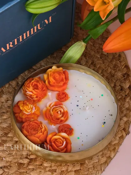 This orange floral urli is perfect for autumn or festive decor, bringing warmth and vibrant color to your table.