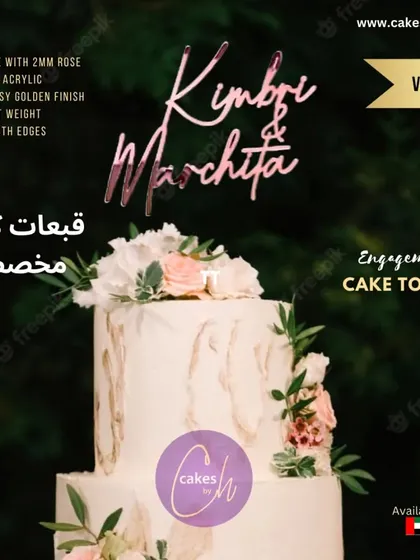 A mockup of the "Kimbri & Marchita" topper on a floral cake, emphasizing its romantic feel.