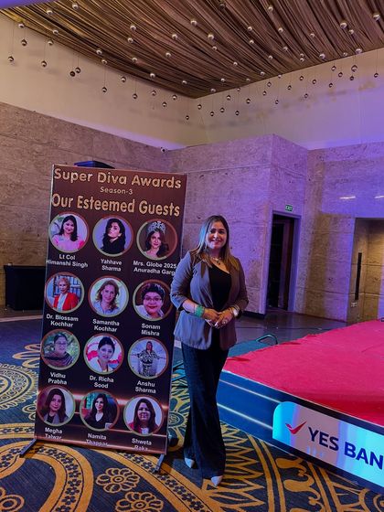 Pictured next to the "Esteemed Guests" banner at the awards ceremony. It is a privilege to be included among such inspiring individuals and to contribute my expertise as a nutritionist.