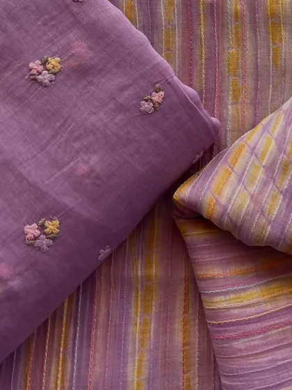 A beautiful combination of embroidered and printed Mul Chanderi fabrics in a lovely lavender shade. Perfect for creating a coordinated suit set.