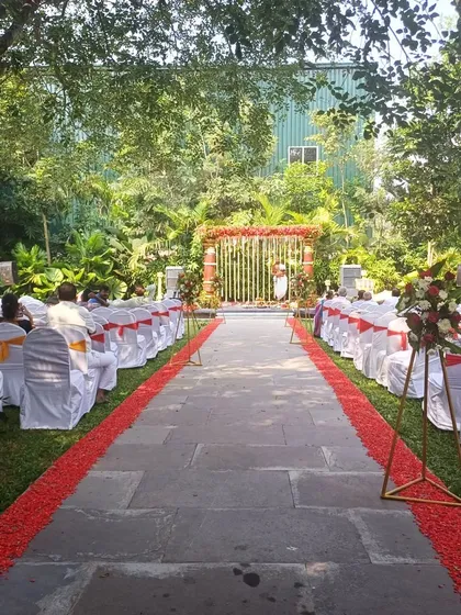 A view of the wedding aisle and mandap from the guests' perspective. This shows how I arrange seating to ensure everyone has a great view of the ceremony, with a clear and beautifully decorated path.