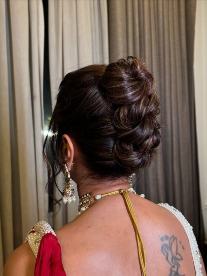 A close-up of the intricate weaving in this stylish updo.