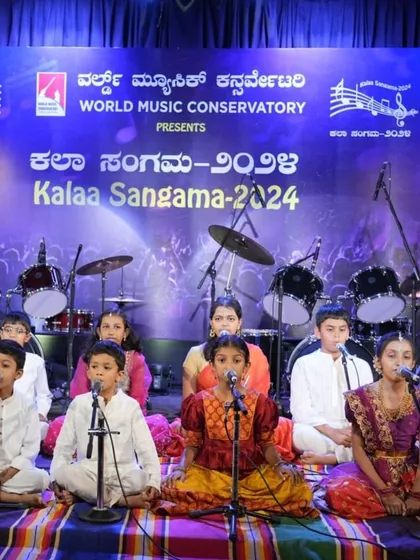 Our Carnatic vocal group, featuring students of various ages, presenting their performance at Kalaa Sangama.