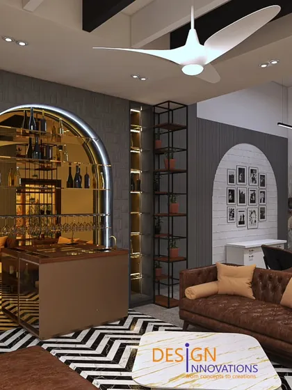 We designed this lounge and bar area to be a sophisticated retreat. The design balances industrial elements with luxurious comfort, featuring an arched bar entrance, rich leather seating, and bold geometric patterns on the floor, creating a memorable and stylish social space.
