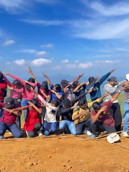 Another energetic group doing the dab pose on a sunny day at the summit. The energy of our groups is contagious.