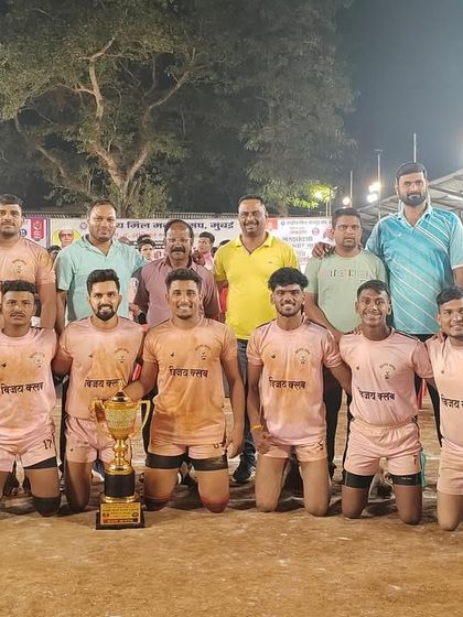 Our senior team in our pink jerseys after winning the tournament organized by Rashtriya Mill Mazdoor Sangh.