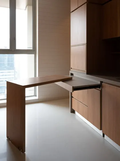 This swivel table is the ultimate flexible solution for compact spaces. It pulls out to provide extra counter space for prep or a small dining spot, and then tucks away neatly, demonstrating how good design can adapt to your needs.