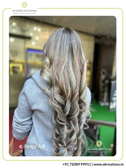 The beauty of expertly blended highlights. This cool-toned blonde and ash brown combination creates a sophisticated look with stunning dimension.