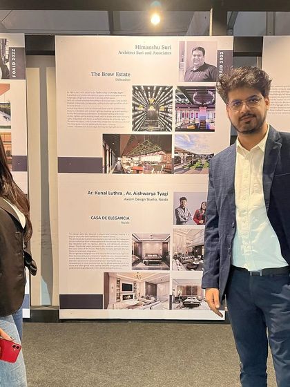 Posing next to our featured work at the design festival.