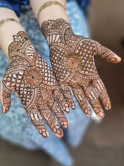 Another angle of this lovely bridal mehndi, showcasing the detailed work on the fingers and wrist.