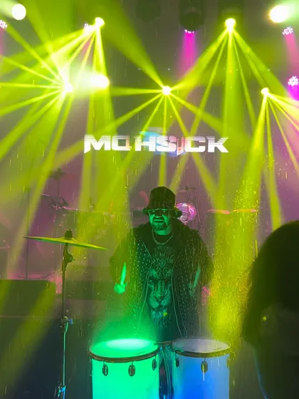 A powerful shot of me on stage in Ranchi, surrounded by lights and my team. Together, we create an unforgettable live experience.