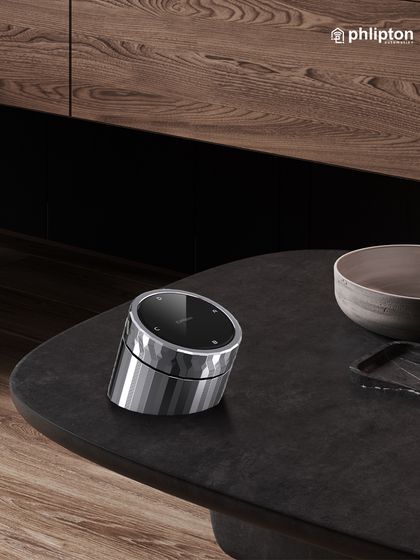 The wireless smart knob is designed to be placed anywhere it's convenient for you. Put it on a coffee table, a nightstand, or carry it with you for effortless control of your pre-set lighting scenes without needing your phone.