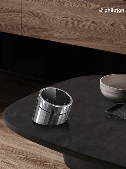 This premium metal wireless knob is a perfect example of form meeting function. Placed on a coffee table, it offers a sophisticated and convenient way to control your home's automated scenes without needing a phone or wall panel.