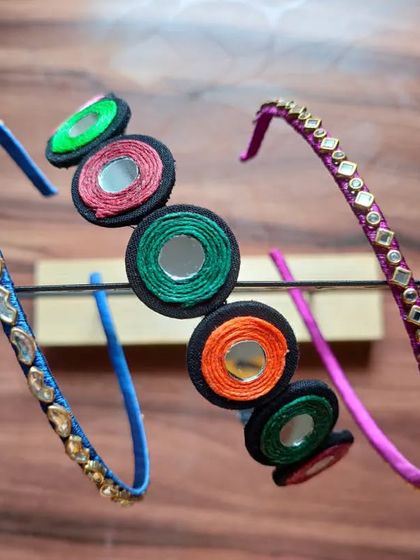 I also create slim, elegant hairbands for a more subtle look. This collection includes a colorful mirror work band and a delicate Kundan work band, perfect for both kids and adults.