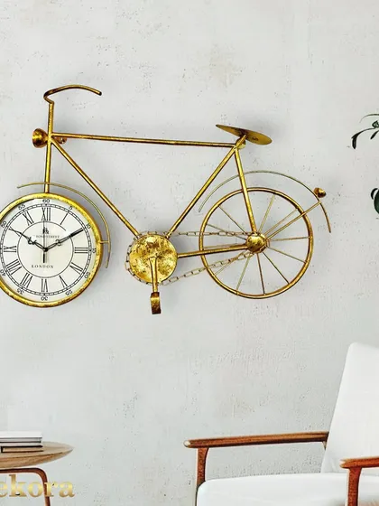 A customer favorite, this golden metal bicycle clock combines whimsical design with a classic clock face, perfect for adding a creative touch to any room.