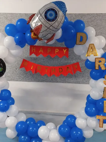 The complete astronaut theme setup, ready for the birthday boy's celebration.