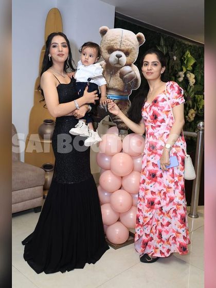 A happy client in a classic black fishtail gown. This timeless silhouette is always a winner for formal events.