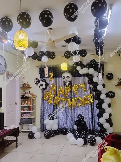 A simple and cute panda themed birthday party in black and white.