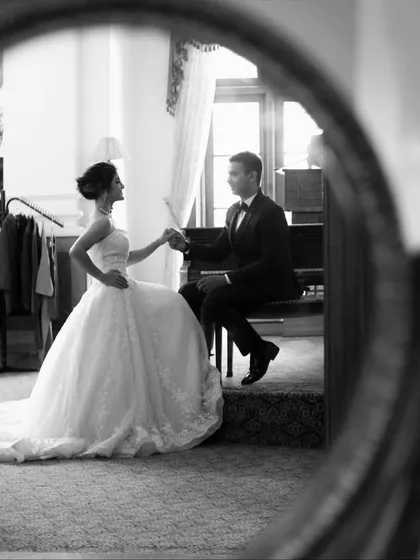 A reflection of a timeless love story. Using creative compositions like this mirror shot, we add an artistic layer to our classic pre-wedding photography, turning a beautiful moment into a piece of art.