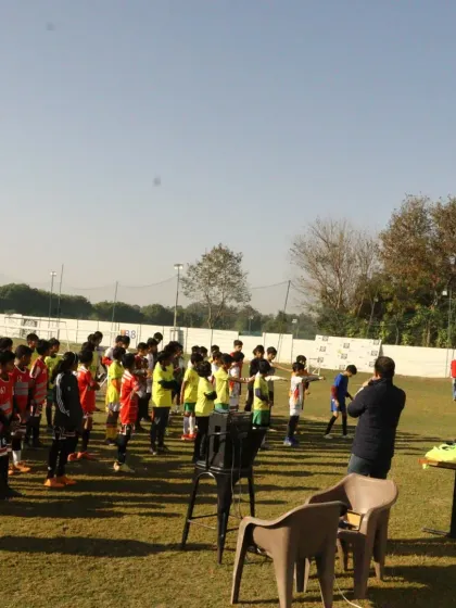A wide shot of our players and coaches gathered for the Republic Day ceremony on our grounds.