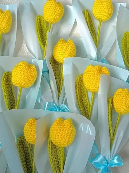 Individually wrapped yellow tulips, perfect for party favors or small gifts.
