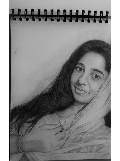 A commissioned portrait where the goal was to capture a simple, serene expression. The softness of the dupatta adds to the overall calm feeling of the sketch.