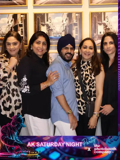 Guests looking stylish and ready to party at The Quorum Club. The custom-branded frame adds a professional and personalized touch to every photo.