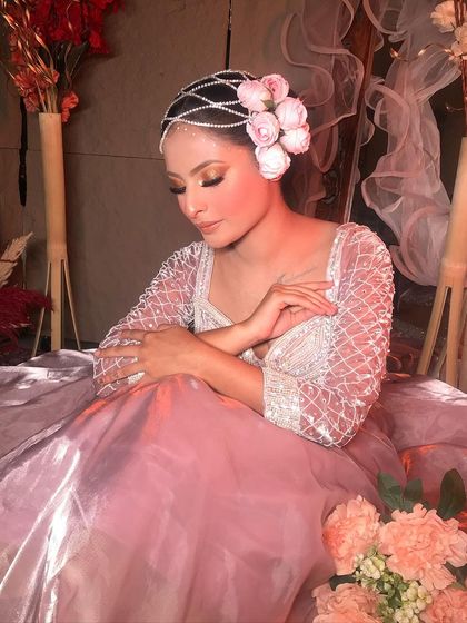 Another angle of the 'Rose' look, highlighting the soft, dreamy quality of the makeup and styling.