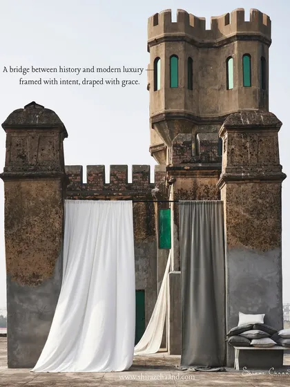 I believe fabric is poetry in motion. Here, we juxtaposed modern luxury drapes against the raw texture of a historic Indian fort, creating a bridge between past and present. This image demonstrates my approach to telling a story through texture, light, and environment.