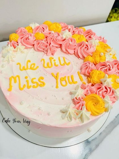 A sweet floral cake to say "We Will Miss You" for a corporate farewell.