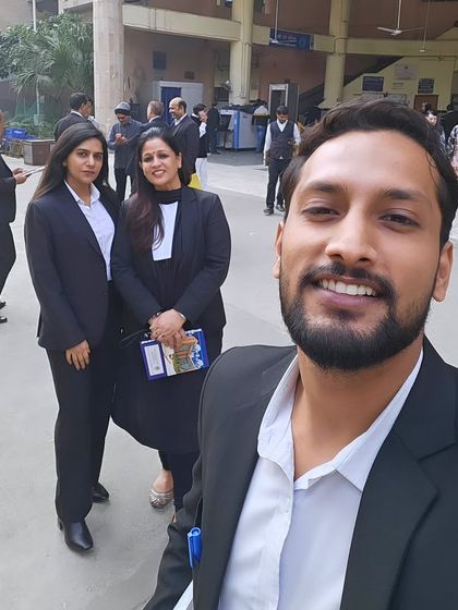 A selfie with my team outside the court. We believe in a supportive and positive team environment, which translates into better service for our clients.