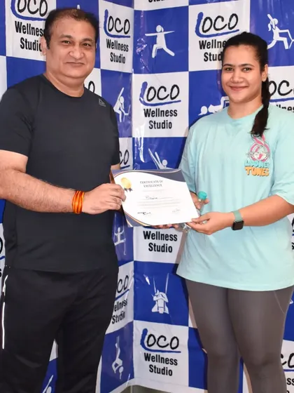 We believe in celebrating every milestone. A proud member receives his certificate after giving his all in our HIIT and Tabata circuit training session.