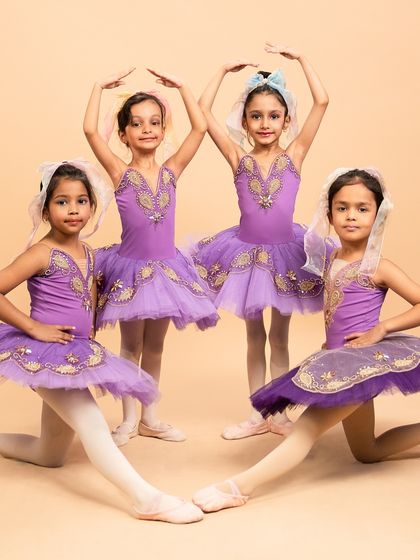 More beautiful poses from our 'Coppélia Reimagined' piece. These young dancers masterfully blend whimsical, doll like nuances with the foundational grace of ballet.
