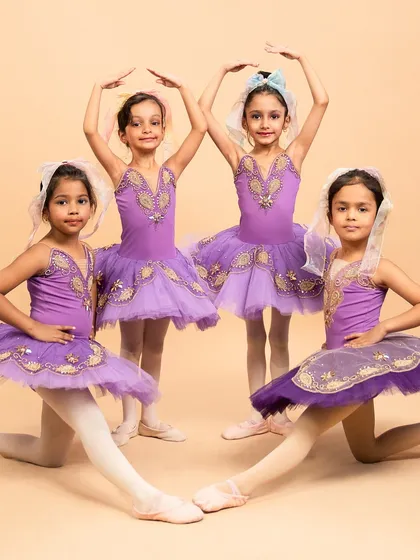 More beautiful poses from our 'Coppélia Reimagined' piece. These young dancers masterfully blend whimsical, doll like nuances with the foundational grace of ballet.
