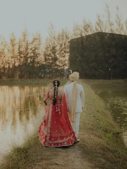 Walking into the sunset, and into a new life together. I love capturing these serene, picturesque moments that feel like the final scene of a beautiful movie. It’s a symbol of the journey you're beginning, side by side.