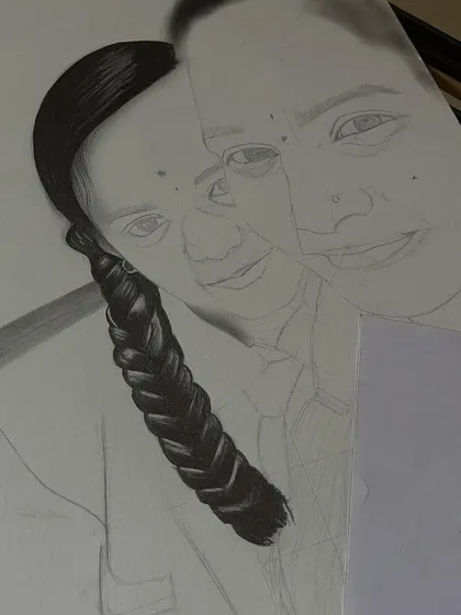 A work-in-progress shot of a realistic portrait, focusing on the detailed work of the hair and face.
