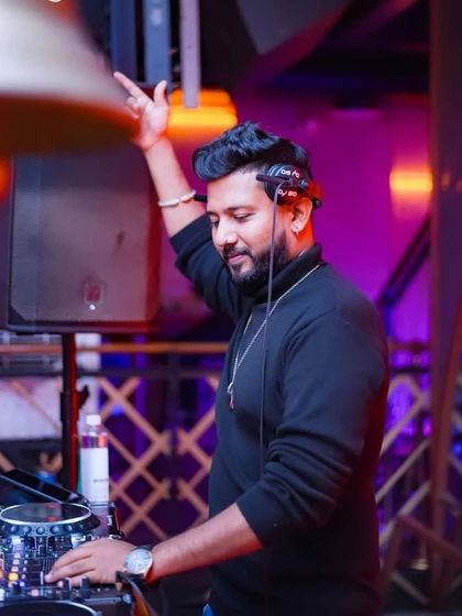 In the zone, raising a hand to the beat. Dreams transform into thoughts, and thoughts into actions.