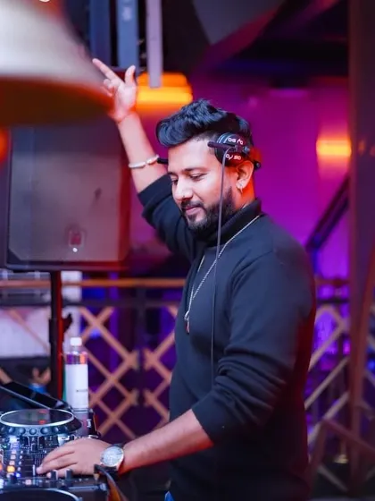In the zone, raising a hand to the beat. Dreams transform into thoughts, and thoughts into actions.